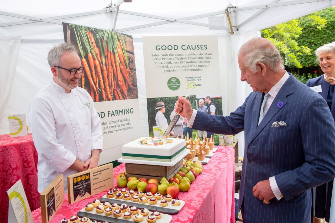 King Charles III cuts cake